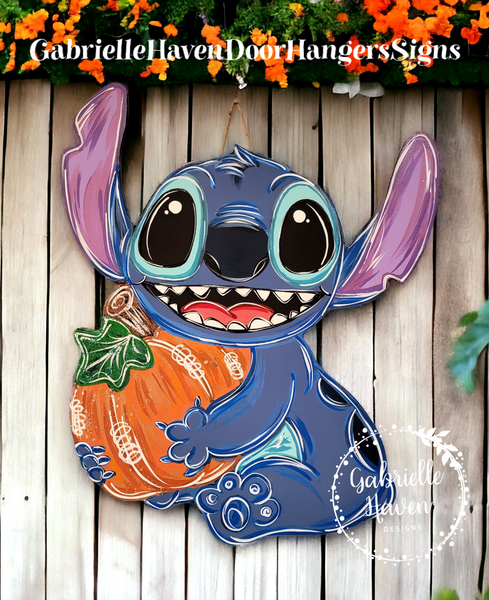 Stitch holding Pumpkin