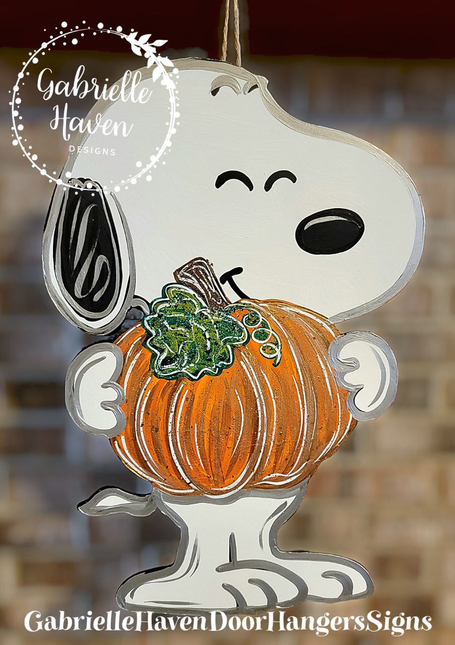 Snoopy Holding a Pumpkin