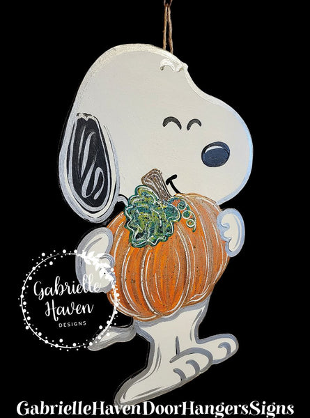 Snoopy Holding a Pumpkin